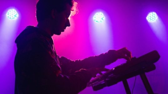 demo-attachment-30-man-holding-dj-mixer-machine-2350325